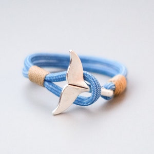 Blue and gold whale paracord bracelet