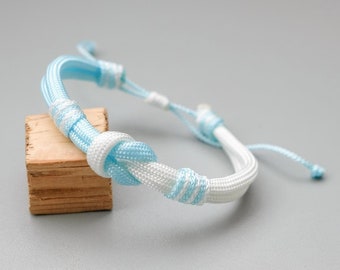 Adjustable blue and white paracord bracelet