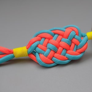 Key door in pink/orange and blue paracord