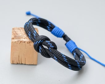 Pulsera paracord ajustable negra y azul