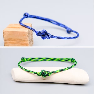 Adjustable paracord bracelet - blue and black or green and black