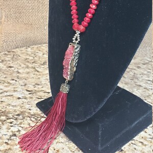 Cranberry crystal and tassel necklace,  Sale 35.00