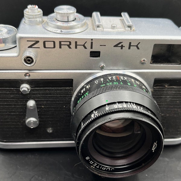 A cased 1970s KMZ Zorki 4K 35mm rangefinder camera fitted with Jupiter-8 2/50 lens