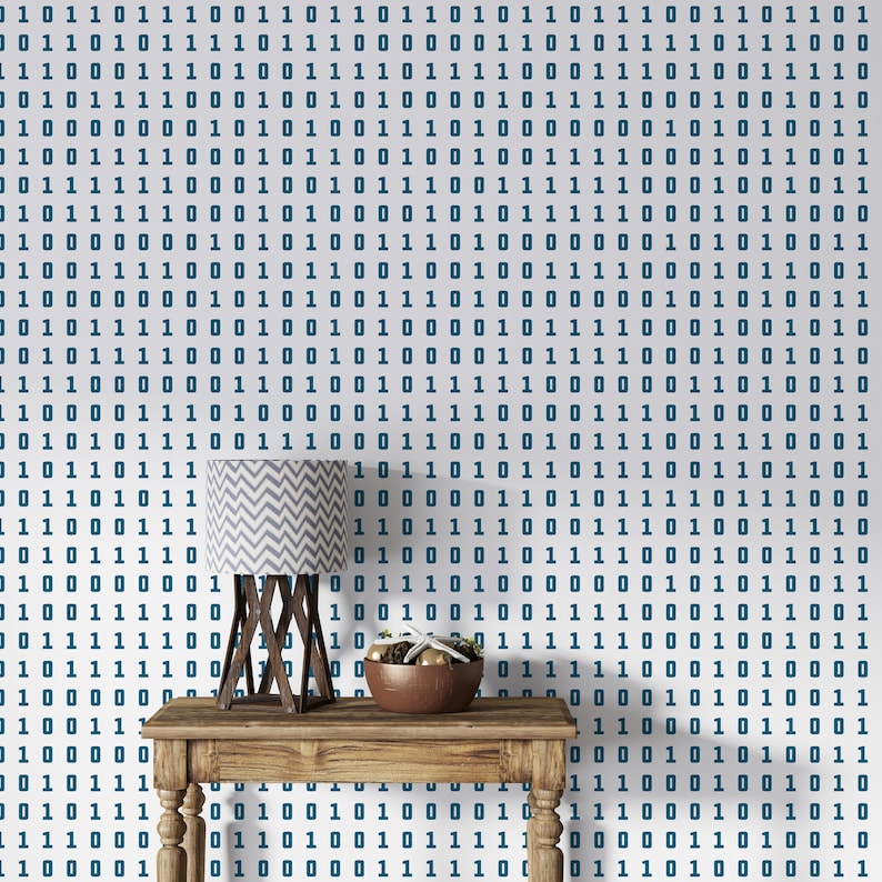 May include: A wooden table with a lamp and a bowl of decorative items. The table is in front of a wall with a white and blue binary code pattern.