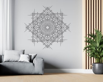 May include: A gray and white geometric mandala design on a light gray wall. The mandala is a circular design with intricate details and a central circle. The design is centered on the wall and is surrounded by a white border.