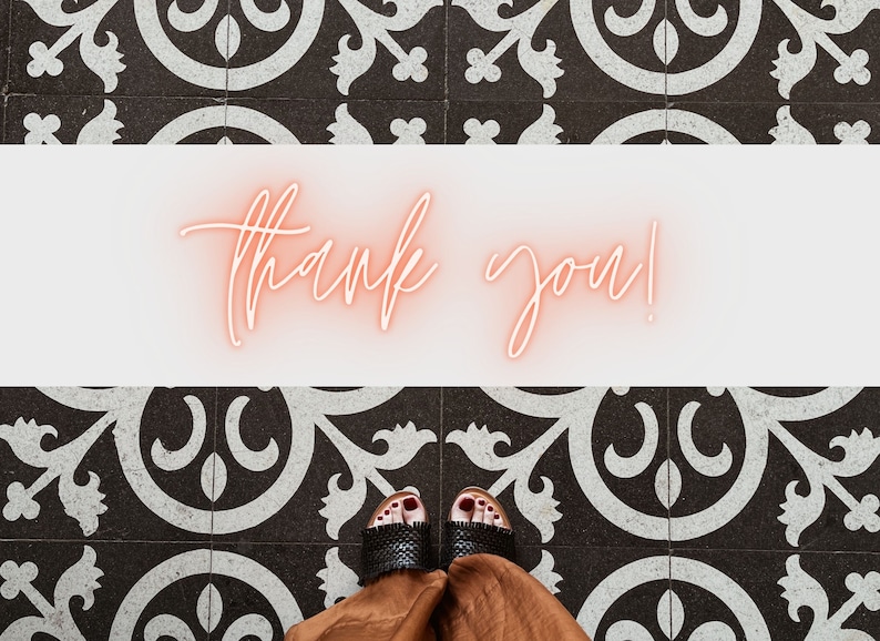May include: A person wearing black sandals with a brown skirt standing on a black and white tiled floor. The text "thank you!" is written in pink neon letters on a white background.