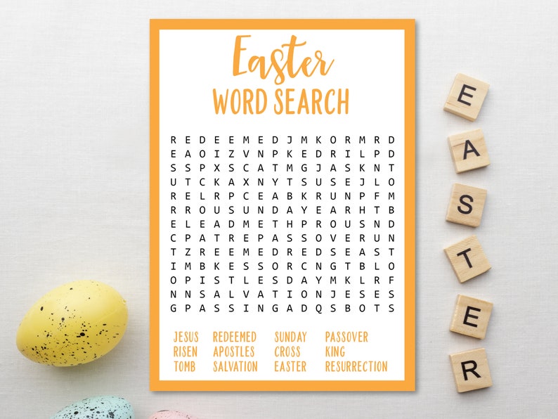 May include: An orange and white printable Easter word search puzzle with the words "Easter Word Search" at the top. The puzzle features words related to Easter, such as "Jesus", "Resurrection", "Salvation", "Cross", "King", "Apostels", "Redeemed", "Sunday", and "Passover".
