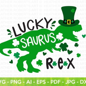 May include: Green dinosaur wearing a green leprechaun hat with a gold buckle. The dinosaur is holding a shamrock in its right hand. The text "Lucky*saurus*Rex" is written in white and black letters.