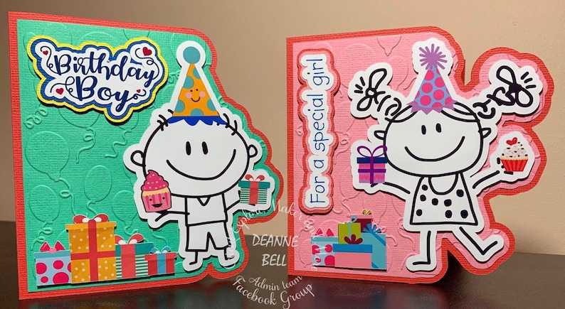 May include: Two handmade birthday cards. One card says "Birthday Boy" with a cartoon boy holding a cupcake and a gift. The other card says "For a special girl" with a cartoon girl holding a cupcake and a gift. Both cards have a red border.