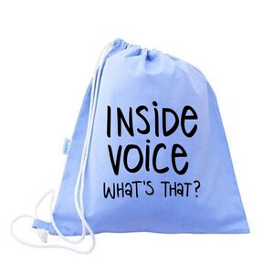 May include: A light blue drawstring bag with the text "Inside voice what's that?" printed in black.