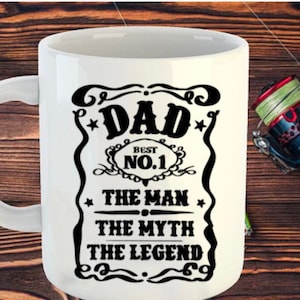 May include: White ceramic mug with a black design that reads "Dad Best No.1 The Man The Myth The Legend".