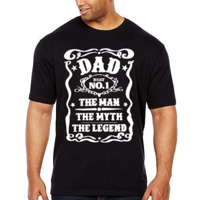 May include: Black t-shirt with a white graphic design that reads "Dad Best No.1 The Man The Myth The Legend".