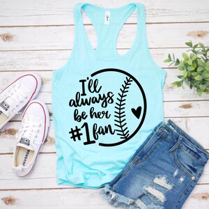 May include: A light blue tank top with a black baseball graphic and the text "I'll always be her #1 fan".