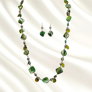 Green color shell bead necklace and earring set with silver beads, hand linked long fashion statement.