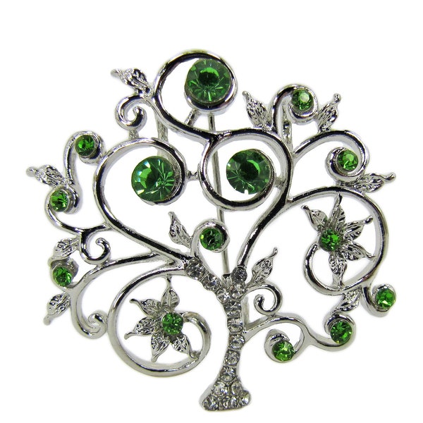 Green crystal tree of life pin brooch with clear crystals and round green crystals set into the brooch.  Silver plated finish tree pin.