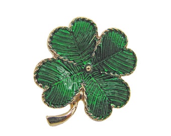 Green four leaf clover pin brooch created in shiny green enamel finish and with a gold plated trim and stem.  Green lucky 4 leaf clover pin