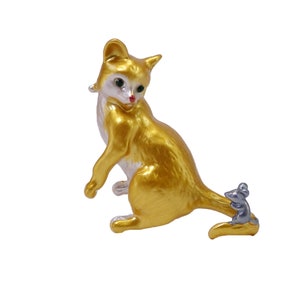 Cat and mouse brooch pin created in a gold and silver enamel color and with green crystal eyes. Fashion cat pin.
