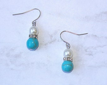 Turquoise and pearl beaded earrings with crystals in center.  Pretty double beaded fashion dangle earrings.