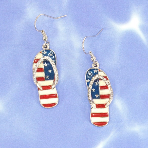 Red, white, and blue patriotic flip flop earrings, made in USA red, white and blue enamel colors and a with crystals on the straps.