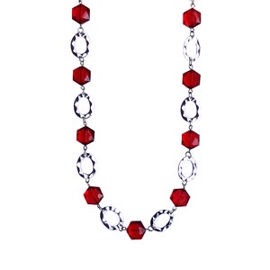 Long red glass beaded necklace designed with red hexagon shape glass beads and polished silver hammered finish links.