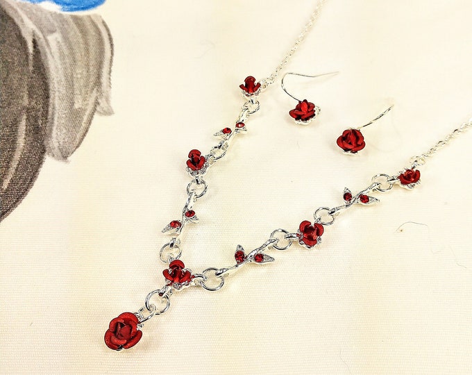 Precious red roses Y necklace and matching earring set with red crystals, red carved metal roses, and with red enamel. Red rose jewelry set