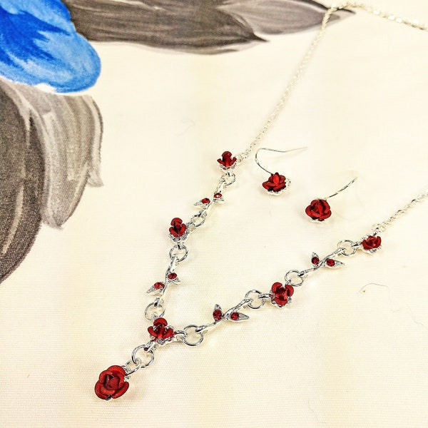 Precious red roses Y necklace and matching earring set with red crystals, red carved metal roses, and with red enamel. Red rose jewelry set