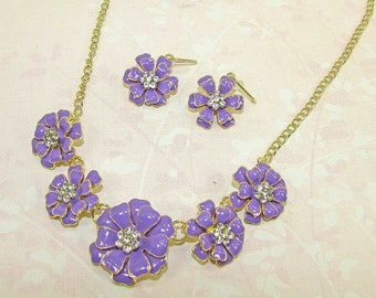 Purple Enamel and Crystal Fashion Flower Necklace and Earring Set. Flower necklace and earring set with purple enamel and clear crystals.