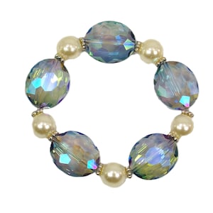 Aqua light blue glass and pearl beaded stretch bracelet created with blue color oval glass beads and white round acrylic pearl beads.