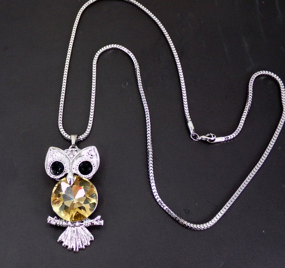 Hematite-look Owl w/ Topaz Crystal Eyes Hematite-look Owl w/ Topaz Crystal Eyes