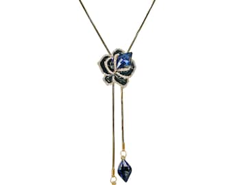 Blue crystal flower lariat necklace designed with enamel and clear crystals in a two tone finish chain.