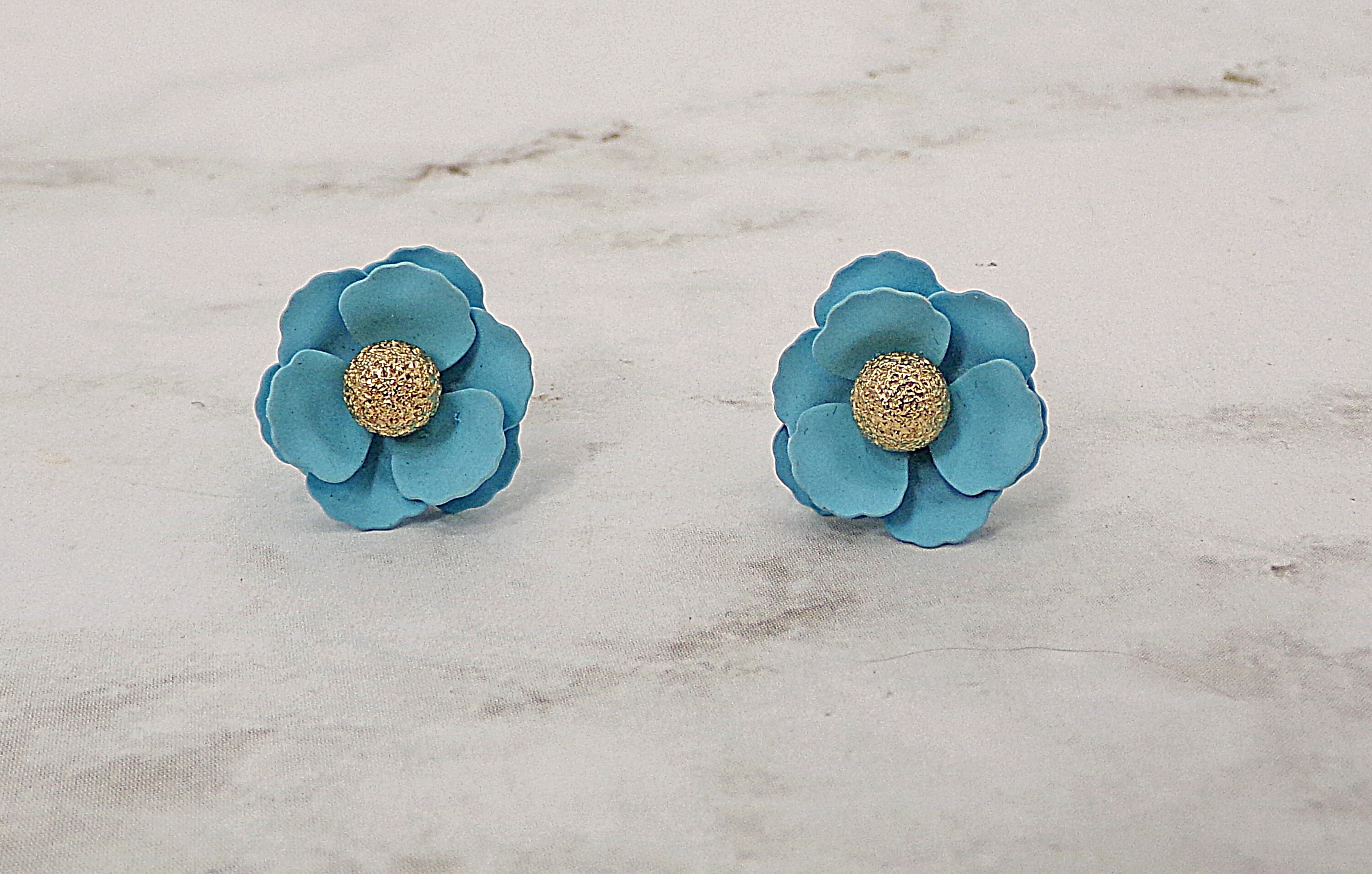 Precious Small Light Blue Flower Earring With a Gold Textured Bead