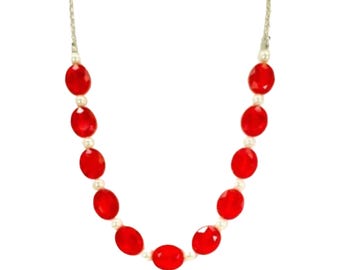 Red glass and white pearl beaded necklace designed with oval and round glass beads.