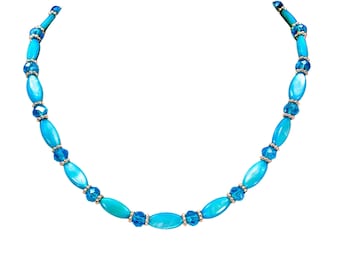 Turquoise shell and glass bead necklace made with oval shell beads and rondelle shape glass beads, mixed with silver spacer beads.