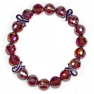 Pancreatic Cancer Awareness purple glass beaded ribbon bracelet to help raise awareness. Stretch bracelet.