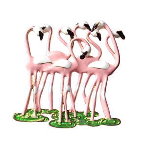 Pretty pink flamingo pin brooch created with multiple flamingos in a pink and white enamel colors