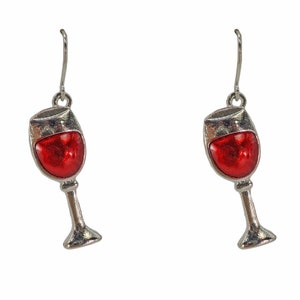 Wine glass fashion earrings designed with red enamel and a polished silver plated finish. Red wine fashion earrings.