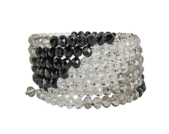 Black, Grey, and Clear Glass Beaded Coil Bracelet designed with a mix of black, grey, and clear facet cut glass beads.