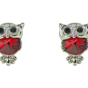 Cute owl earrings created with a red crystal and black crystal eyes in an antique silver plating finish. Owl jewelry.