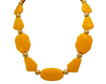Yellow and gold bead necklace designed with a mix of yellow shape beads and round matte gold color beads.