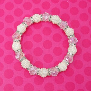 Clear Glass Beaded Stretch Bracelet with Crystals, and White Pearl Textured Beads. White beaded fashion bracelet.