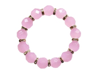 Pink glass bead stretch bracelet with clear crystal spacer beads. Soft pink color beads.  Women's fashion bracelet.