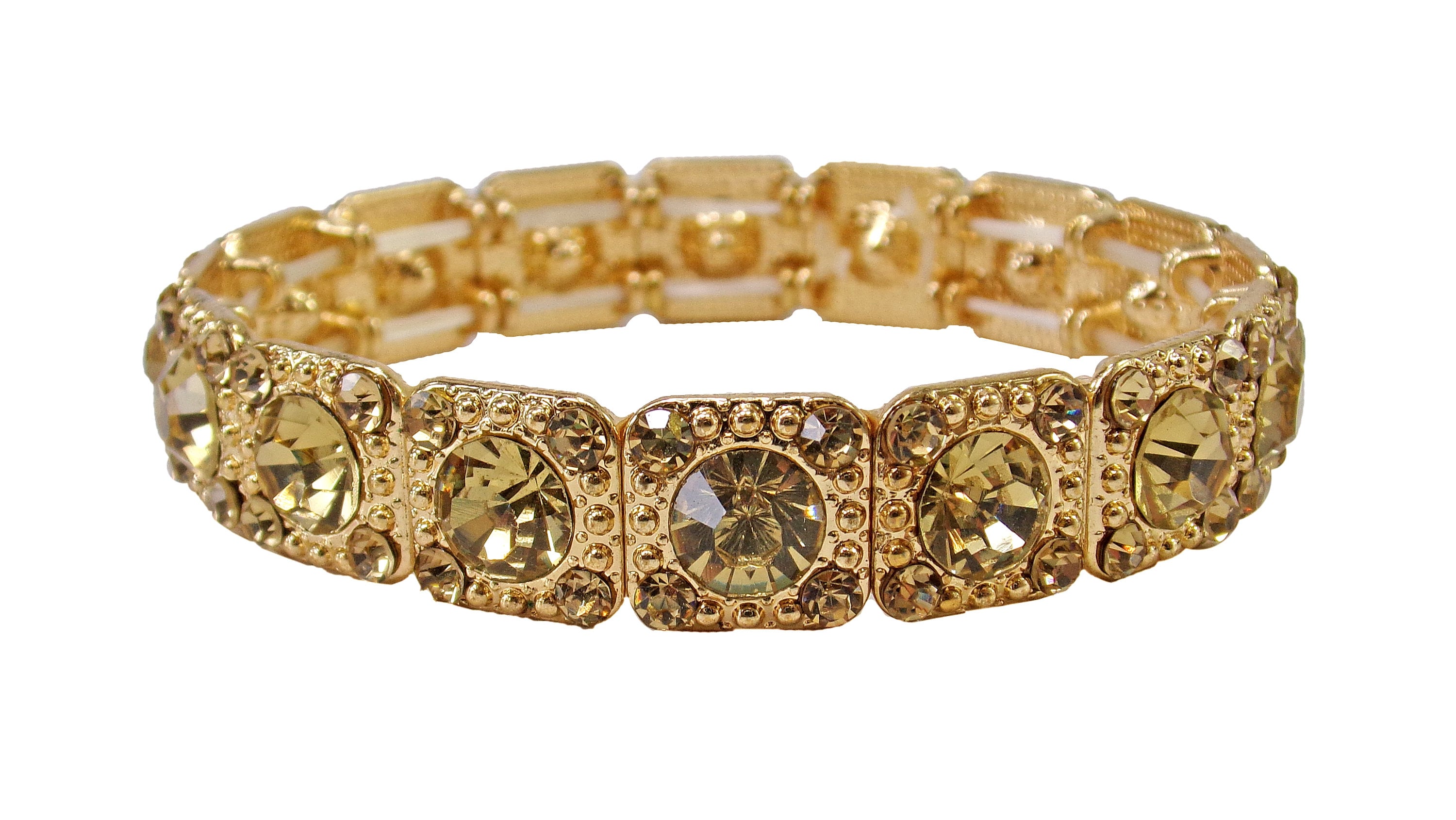 Golden topaz color crystal stretch bracelet round crystals and textured bead finish. Each square section has five crystals set into them