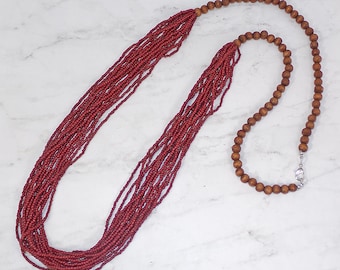 Long red berry color seed bead necklace with wood beads. Multi strand seed bead statement necklace.