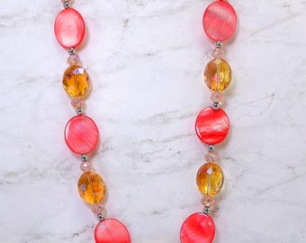 Coral Shell and Golden Topaz Color Glass Beaded Long Necklace accented with pink glass and silver beads. Shell and Glass Beaded Jewelry