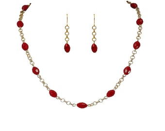 Red glass bead necklace and earring set made with oval glass beads and gold round link chain.  Women's fashion red jewelry.