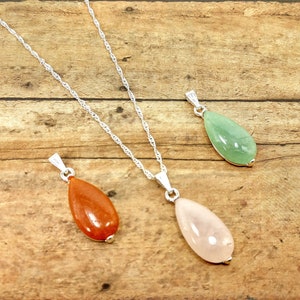 Interchangeable 3 Stone pendant Set in rose quartz, green, and orange aventurine.  Interchangeable three stone teardrop pendant set