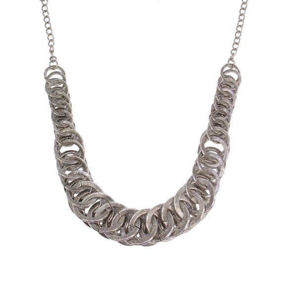Silver Link Statement Necklace Designed With Silver Color Metal