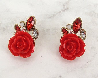 Precious red carved rose earring with a red marquise crystal, clear crystal, and white accent crystals.