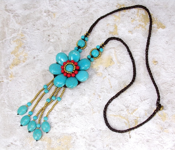 Just look at my new crochet bead flower necklace. I think it is very  interesting color combination! : r/crochet