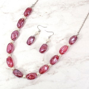 Purple and white pearl beaded necklace and earring set with purple beads in a marble swirl look finish, glass pearls.